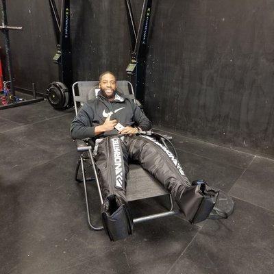 CrossFit Regional Athlete, Marquan Jones using the Normatec Recovery Boots to get ready for this next Wod.