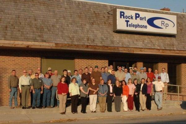 Staff of Rock Port Telephone standing in front the office.