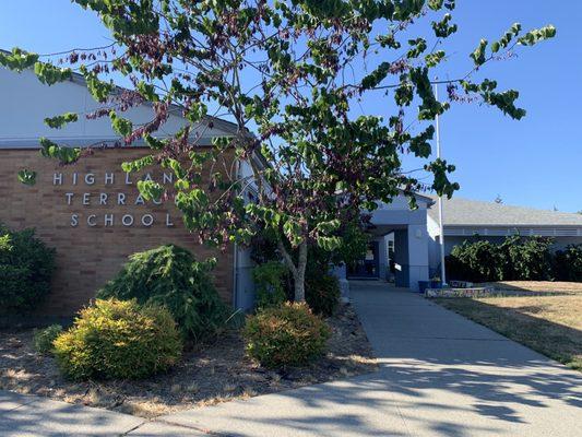 School name and walkway to the front entrance.