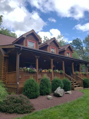 Log cabin oil staining