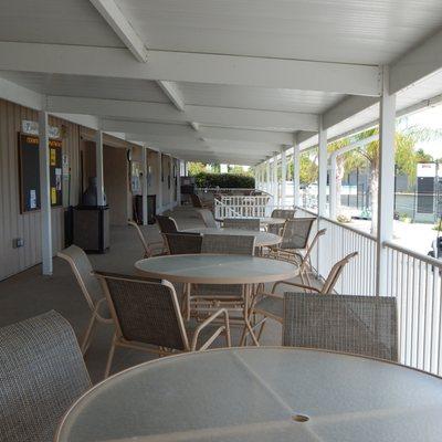 Or just relax on the back veranda overlooking the tennis courts and the pool.