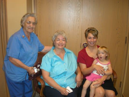 Four generation picture of Aurora Schools Credit Union members.