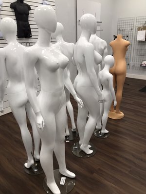 White glossy mannequins