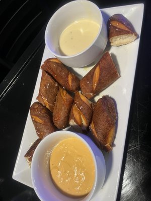 Beer cheese pretzel with queso