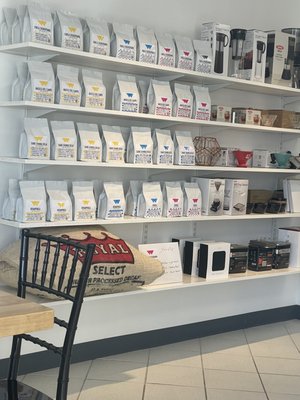 Amazing array of different beans to take WeRoast home with you, different kinds of brewing your coffee along with mugs/glasses