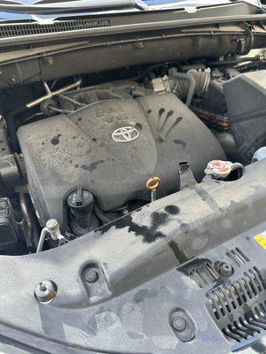 Oily mess under the hood. We bought this car new. This is not how it is taken care of.