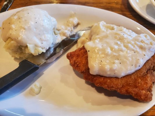 Dinner size chicken fried chicken with mashed potatoes