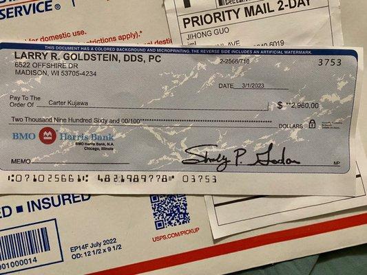 Phony check front. No watermark, thin cheap copier paper, and looks like an inkjet was used.