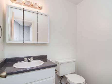 Bright and airy bathroom with vanity lighting