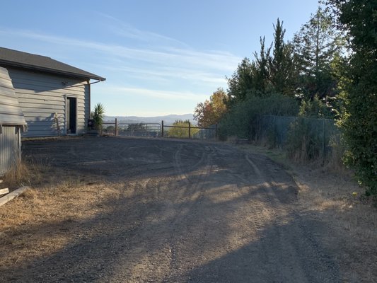 Rough grading existing driveway