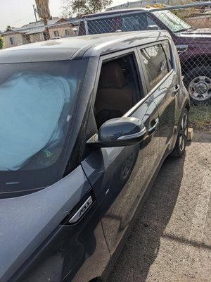 Broken driver side window, glass everywhere and items stolen.  Many other cars the same way.