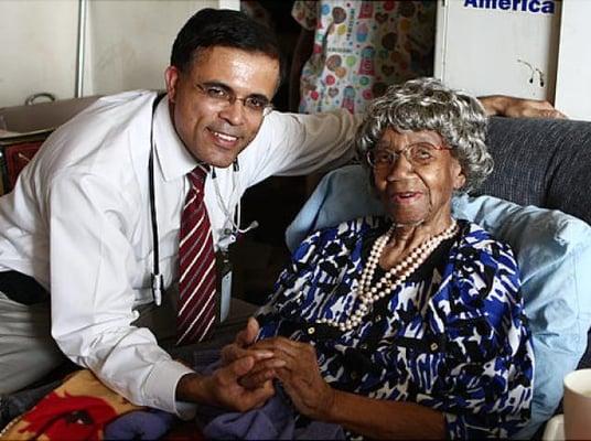 EssenMED House Calls Medical Director Dr. Sumir Sahgal pictured with 107-year-old patient, Ms. Louise Mitchell.