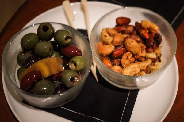 Complimentary bar snacks (marinated olives are gluten-free)