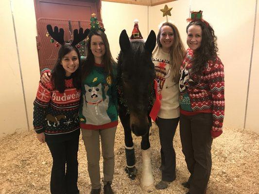 Our 2018 Interns getting in the holiday spirit with Zoey!