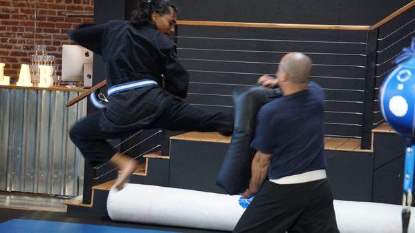 Coach Seabass demonstrating a spinning back kick.