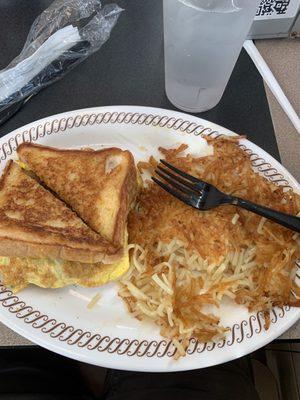 Egg cheese and sausage melt with hash browns