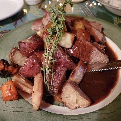 Pot Roast with gravy, potatoes, carrots, and turnip