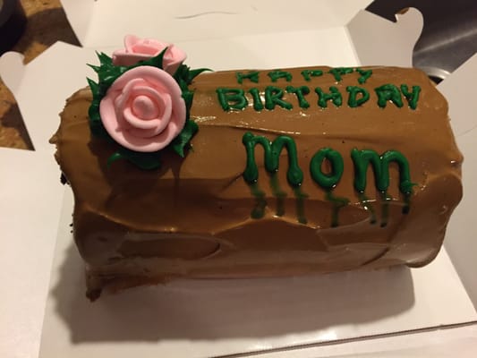 This cake was covered in chocolate ice cream that looked terrible! No frosting and dripping letters! Not Mom worthy at all!