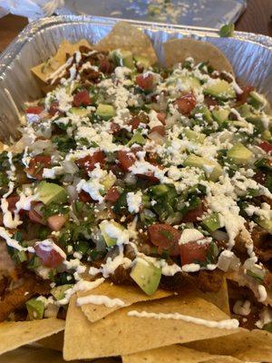 Al pastor family style nachos ($12)