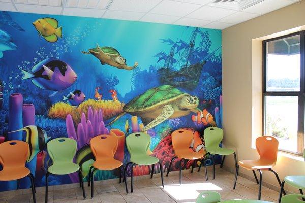 Fun murals in waiting rooms and exam rooms!