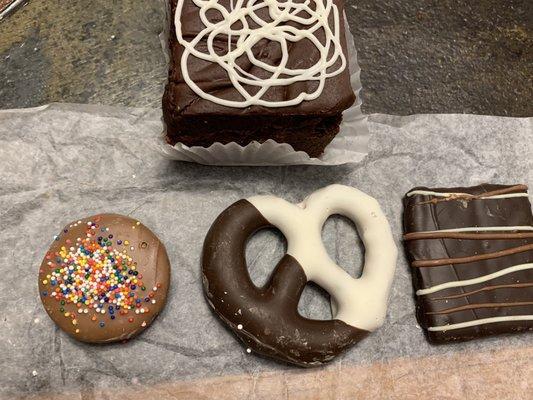 Chocolate cover Oreo, pretzel, and graham cracker. Brownie