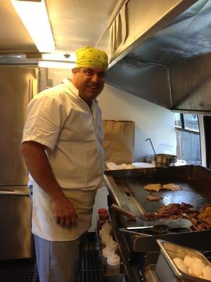 Chief Craig at the grill for the Mothers Day Breakfast.