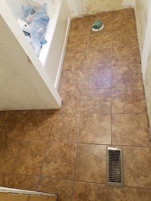 Guest bath remodel with ceramic tile floor