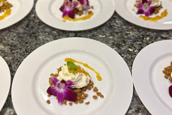 Deconstructed NY style cheese cake mousse with roasted peach puree, biscoff cookie crumble