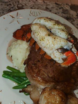 Surf and Turf 
(8oz. Ribeye and Lobster tail) 
Garlic Mashed Potatoes 
Green Beans