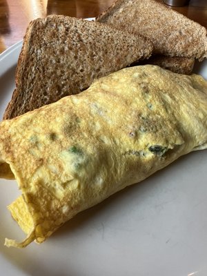 Omelet w/broccoli, tomato and cheddar.  Plate is kind of bare without home fries.  Didn't know I had to order (and pay extra) for them.