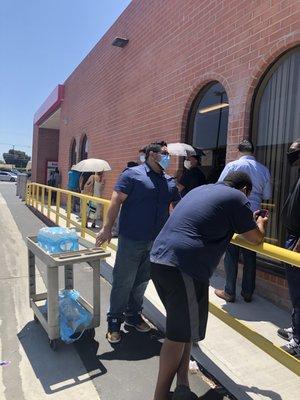 Line all the way out side but The elderly get free water. That's almost all the way nice :/