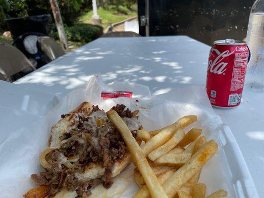 Philly Cheesesteak, Fries, and a drink. $12