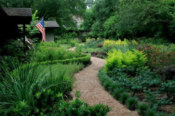 Incredible biodiversity and textural contrast make for this stunning stroll through a gorgeous garden, created by our in-house design team.