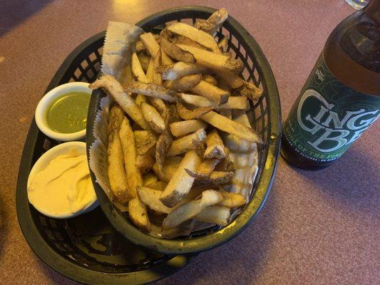 Fresh cut fries with roasted garlic aioli and chimichurri sauces .