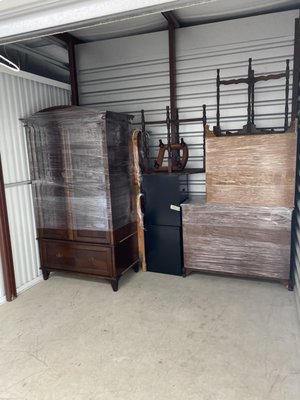 Furniture and appliances moved in to storage.