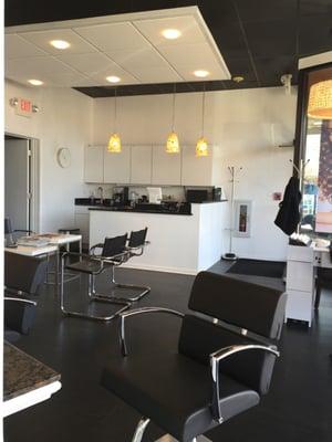 Waiting area, kitchen, and nail station