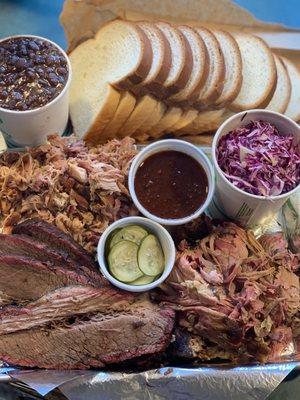 Brisket, pulled pork, smoked chicken, black beans, coleslaw with homemade bbq sauce and pickles.