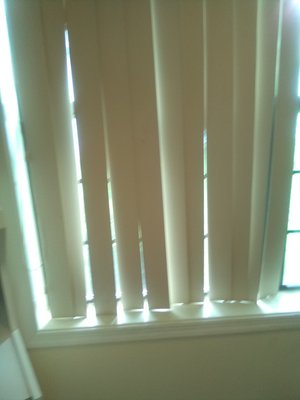 Another view of how uniform my vertical blinds hang.