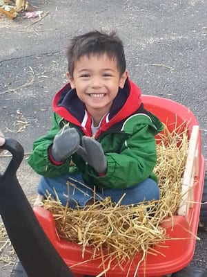 Enjoying a ride at the Lily Garden Family Fall Festival