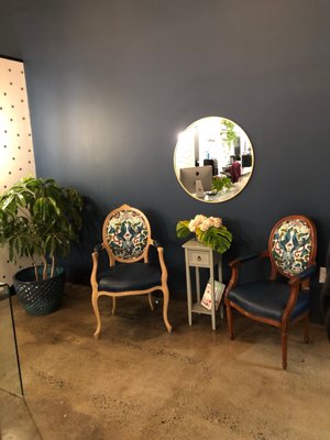 Some antique refurbished chairs in the reception area