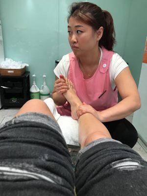 Getting pampered in Connecticut with a pedicure and foot massage. Necessary for a hardworking stylist.