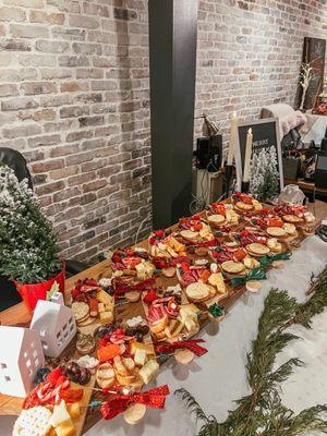 Individual charcuterie board spread for a holiday work party.