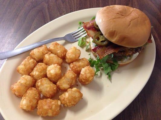 Spicy jalepeno style burger and tater tots