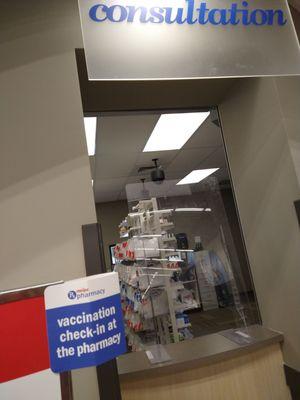 This is NOT the check-in window for COVID vaccinations. Go to the prescription drop off window.