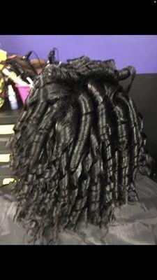 Spiral curls with marcel iron but soft and heat protectant used Also done with rollers and rods if preferred