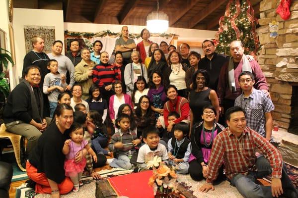 Partying together after Christmas caroling at local nursing homes