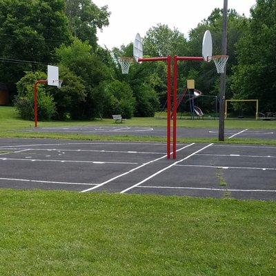 two half courts and one full court for basketball appear in good condition