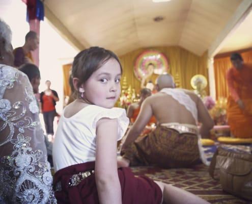 starting them young; relative's ceremony to initiate monkhood.