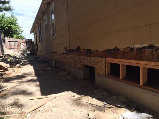 House with foundation issues. We had to raise the house 7 feet and pour a new concrete foundation all the way around the base of the house.