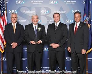 Todd Feigenbaum accepts the 2012 Small Business Excellence Award from he U.S. Small Business Administration